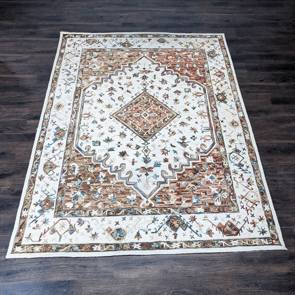 Handcrafted wool Loloi Beatty rug with subtle patterns, variegated colors, and traditional hooked construction.