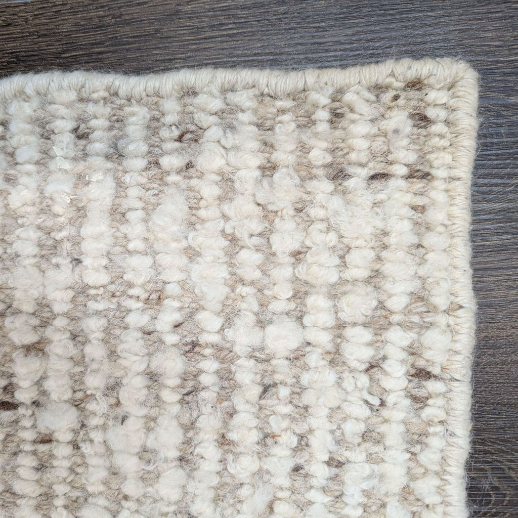 Neutral-toned Lulu and Georgia rug, gently used, adds comfort and elegance to living rooms, bedrooms, or offices.