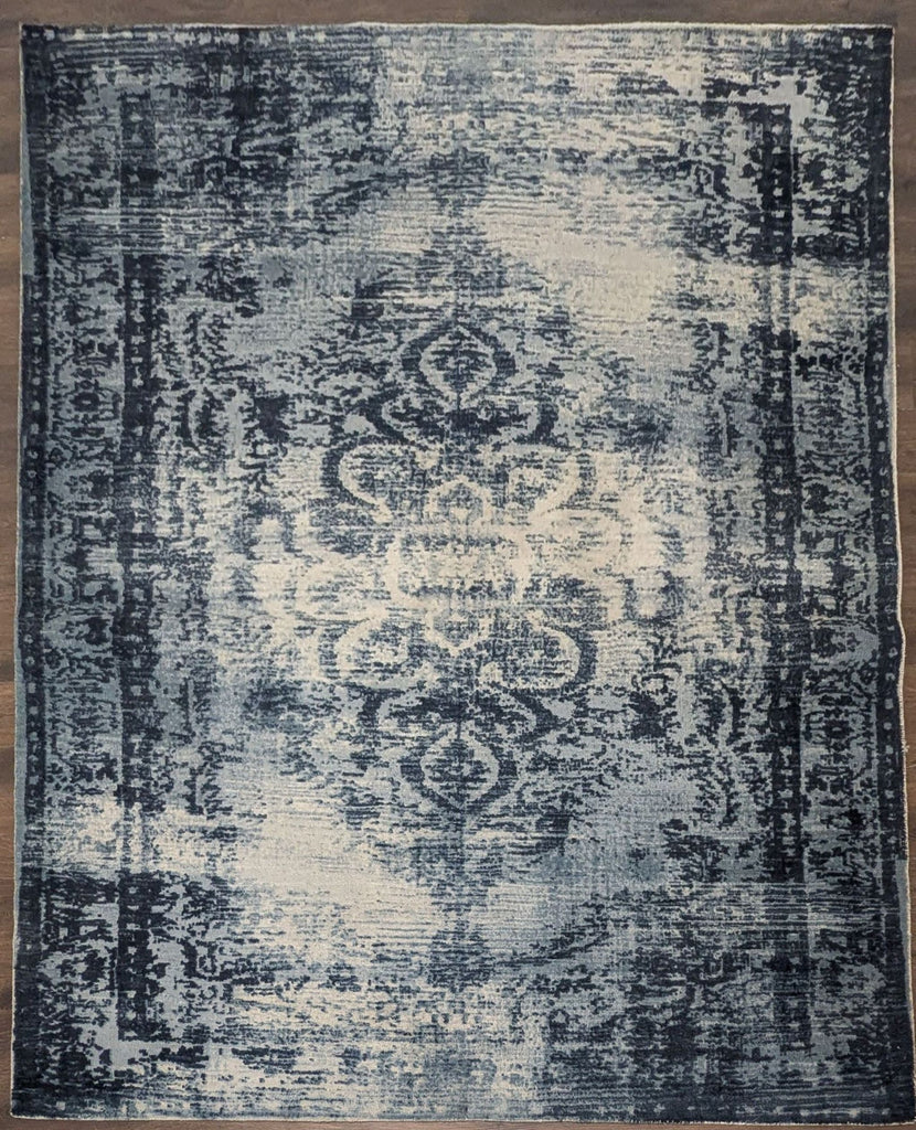 Blue and ivory trellis rug by West Elm, 8x10 size, features a soft, low-pile, and modern vintage design.