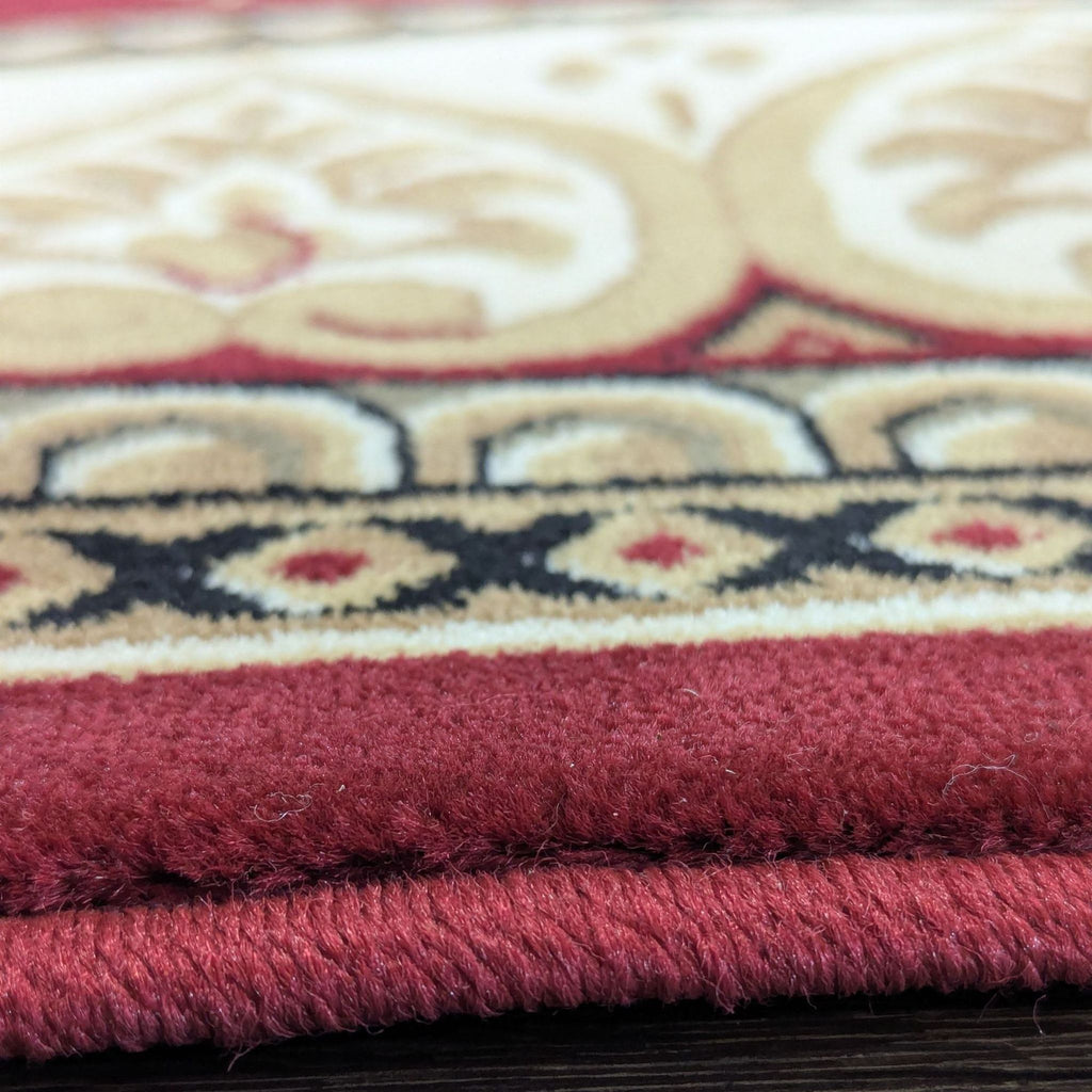 Classic red polypropylene rug with intricate Fleur De Lis design, featured as a statement piece in home decor.