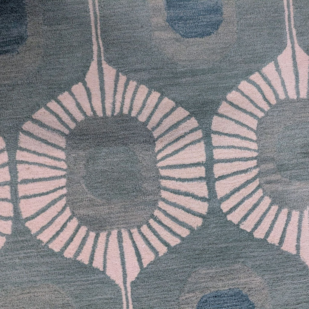 Bashian brand rug featuring modern blue and cream geometric designs; suits living rooms or offices.