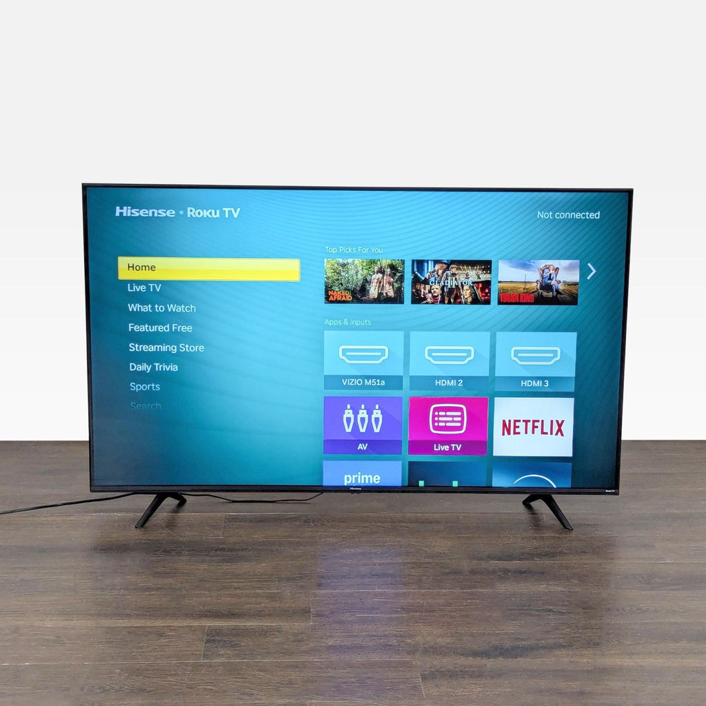 Hisense 50-inch Roku Smart TV with a clear display and simple Roku home screen, in good condition.