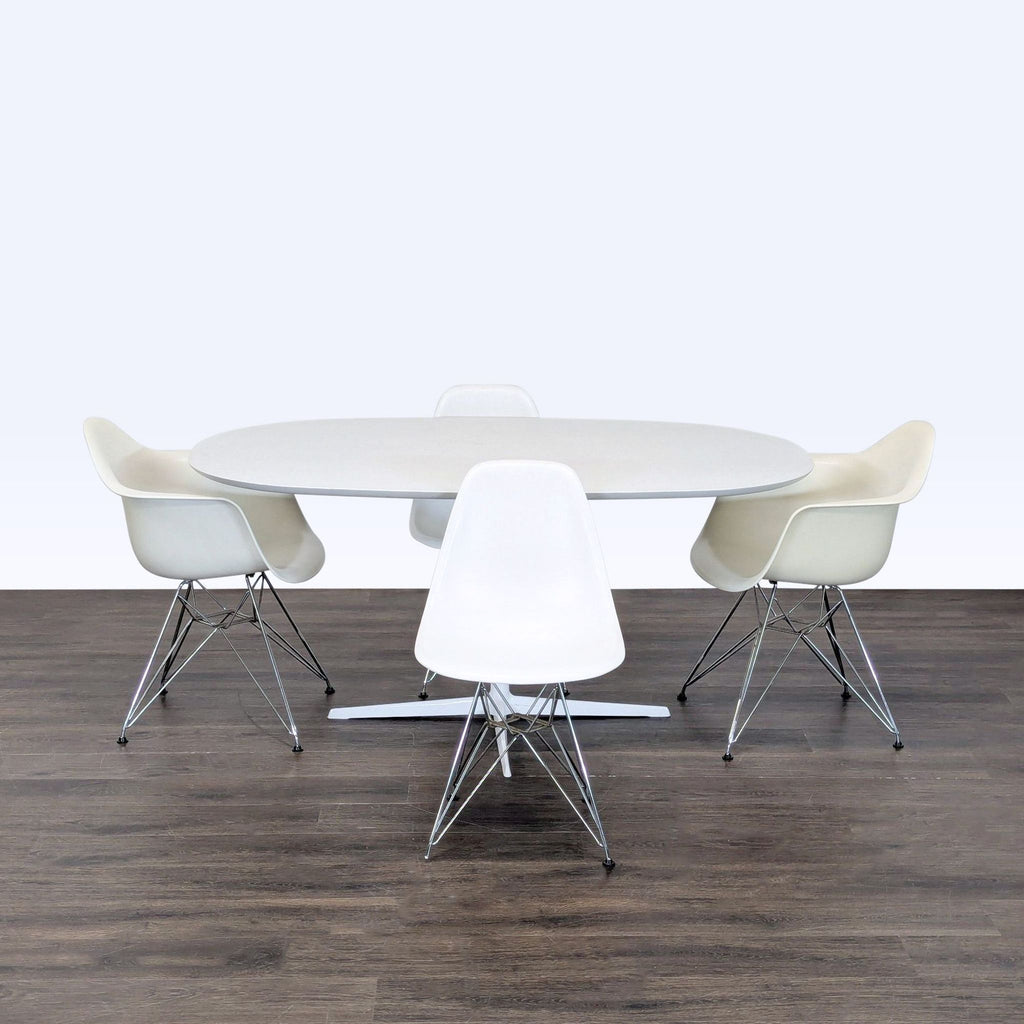 Eames Dining Set with white oval table and four matching modern chairs, ideal for kitchens or dining rooms.
