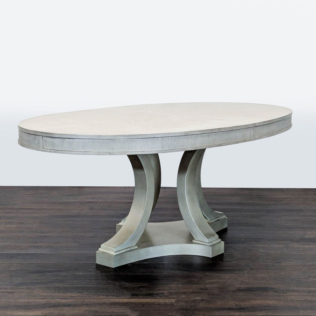 Legacy Classic Cinema dining table, walnut veneers, shadow grey, includes one leaf, expands for gatherings.