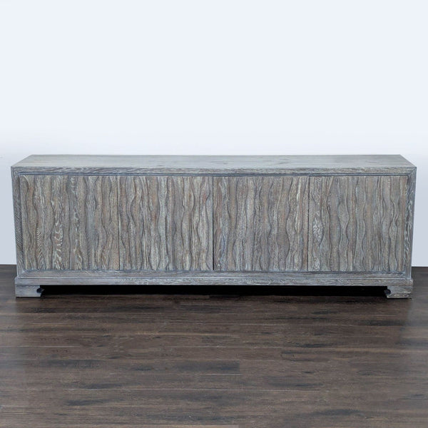 Gray washed entertainment center by Vanguard Furniture with sculpted cabinet doors and modern design.