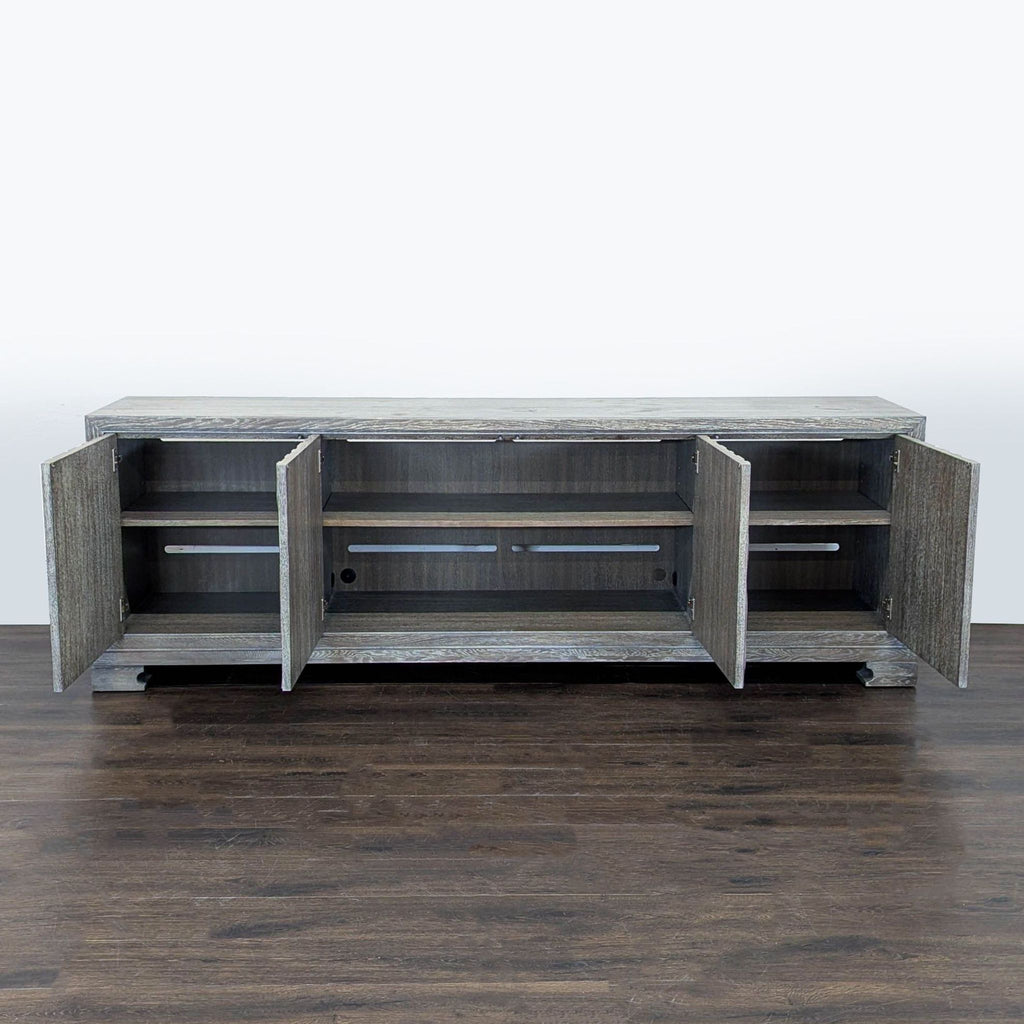 Vanguard Furniture entertainment center featuring gray finish and detailed sculpted cabinet doors.