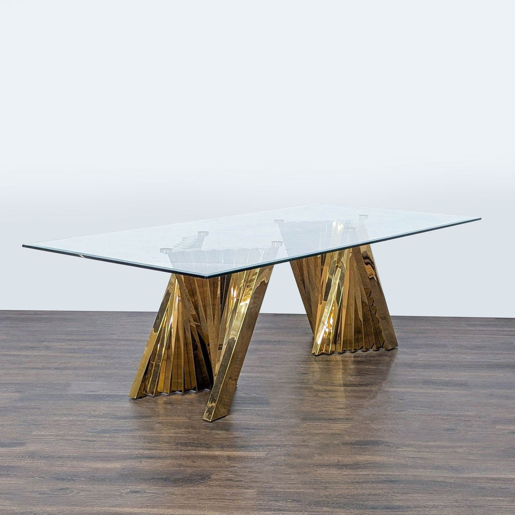 2. Rectangular glass dining table featuring stainless steel spiral pedestal bases with brass accents, Willa Arlo Interiors.  