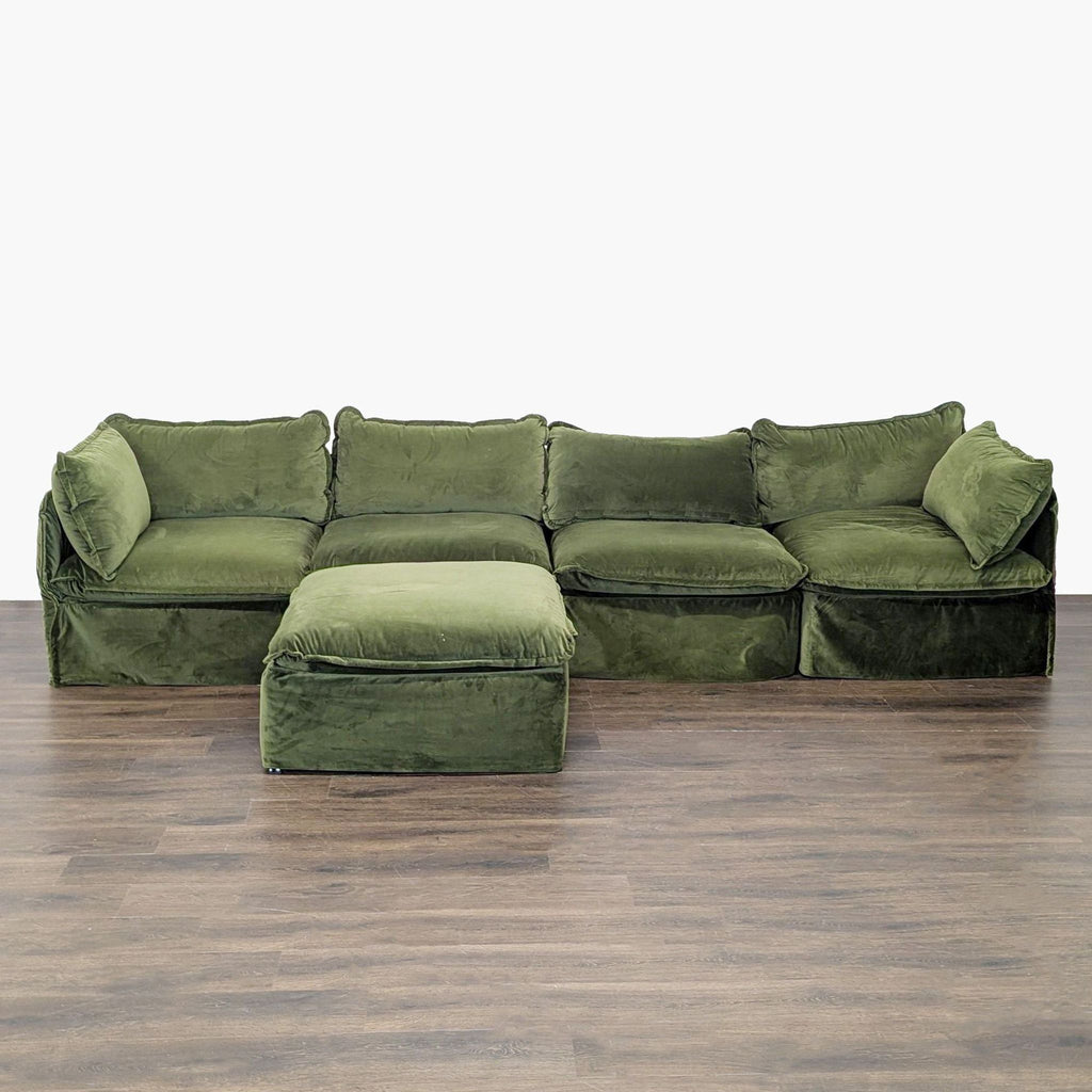 Anabei modular green velvet sectional sofa featuring a matching ottoman, ideal for customizable living room arrangements.