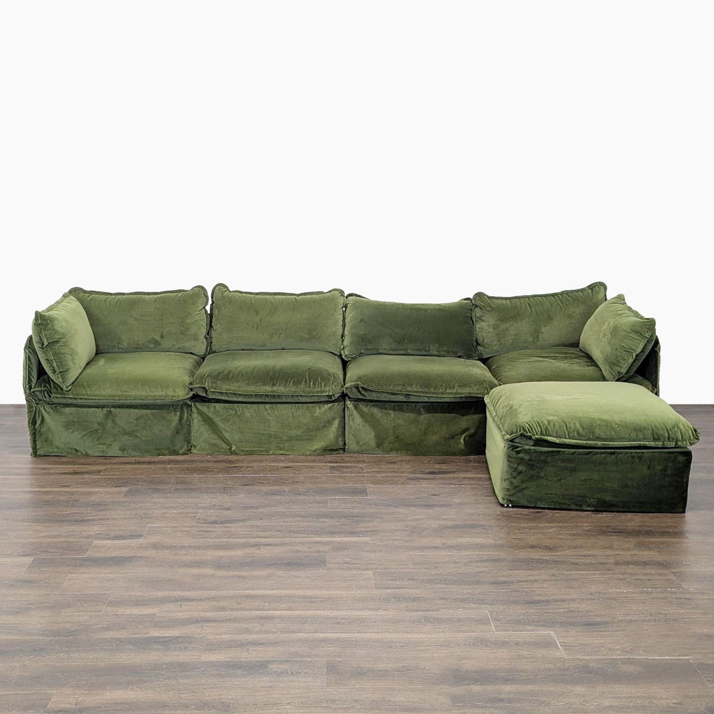 Green Anabei sectional sofa with washable velvet fabric, modular design, and removable ottoman for flexible seating.