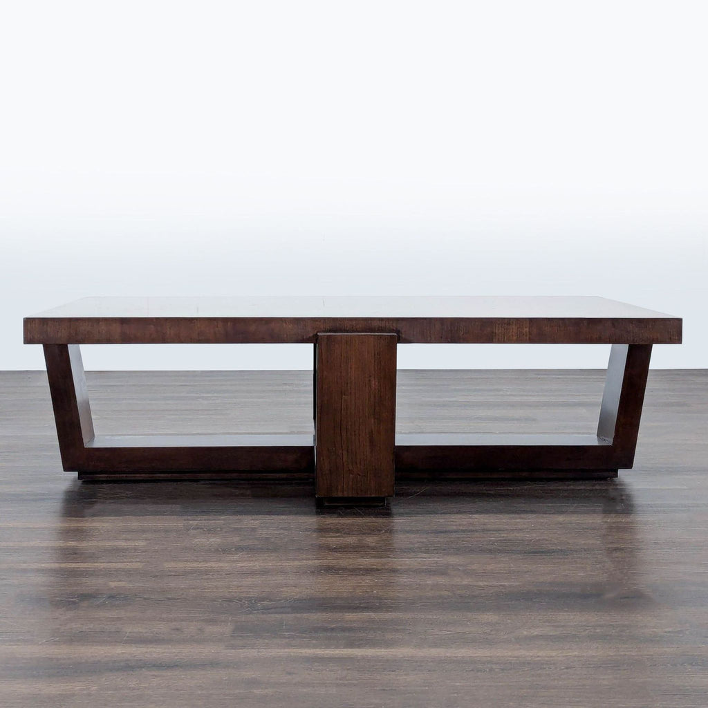 3. Contemporary coffee table in cherry wood with a soft gray mocha finish and structured angular base, Lexington brand.