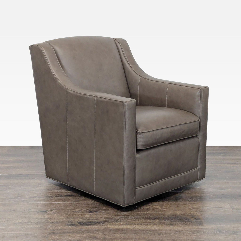Lexington lounge chair featuring smooth taupe leather upholstery, supportive backrest, and sturdy frame.