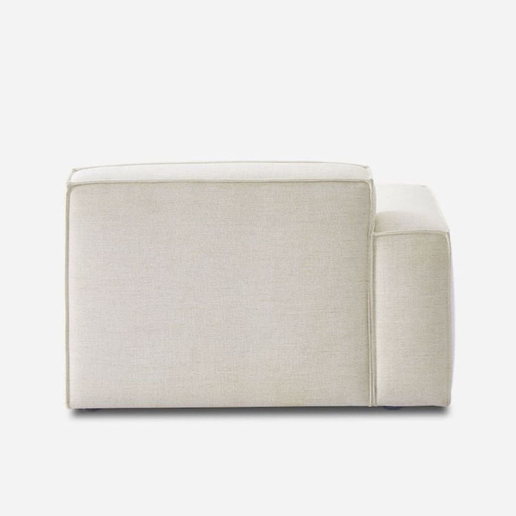 Castlery chair in off-white with left-side armrest; deep, comfy seat suits living rooms and cozy spaces.
