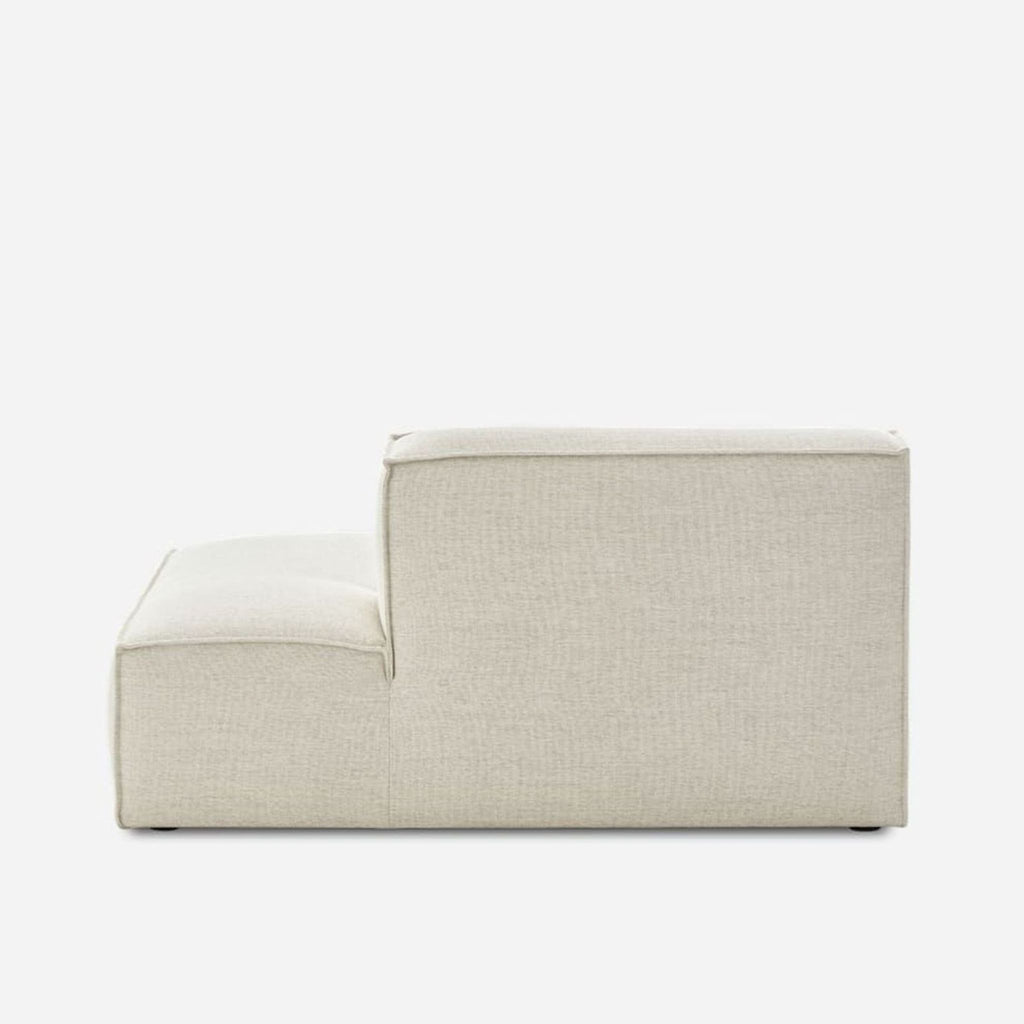 Modern Castlery sectional seat in soft white fabric, featuring clean lines and a low, comfortable profile.