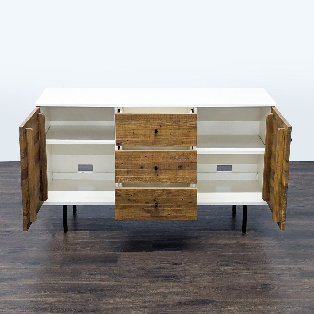 2. Open view of West Elm sideboard showing internal shelves and drawers, suitable as a media console.
