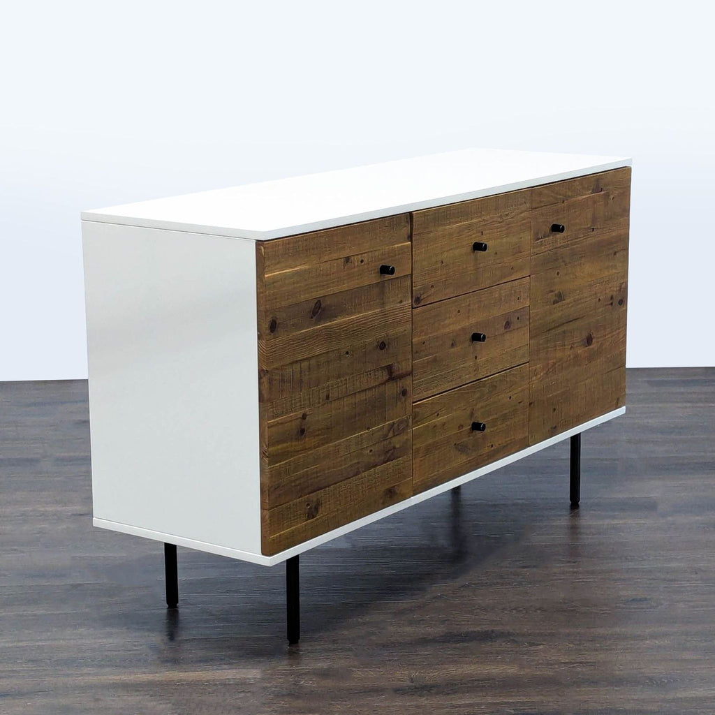 3. Angled view of West Elm mid-century sideboard made from reclaimed wood with white lacquer frame.
