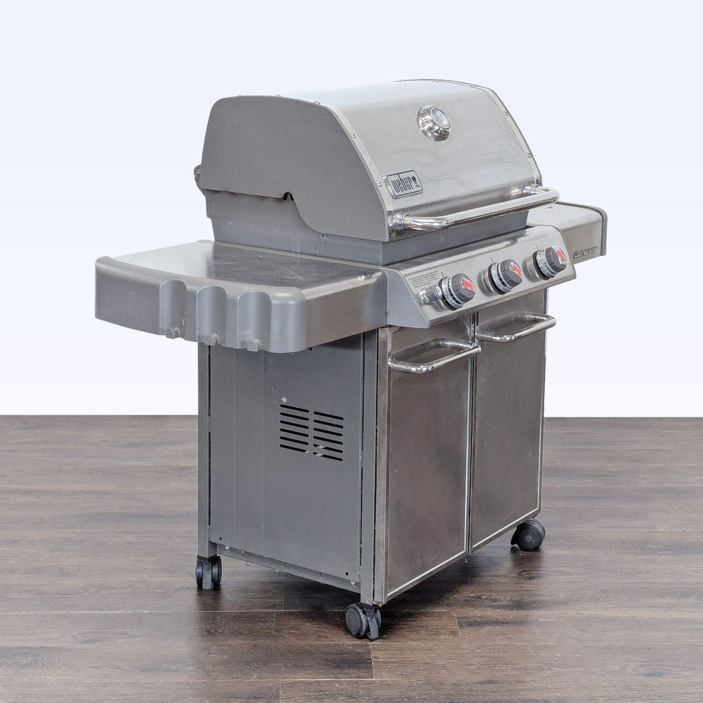 Premium Weber propane grill with stainless finish, three control knobs, and a visible side burner for outdoor cooking.