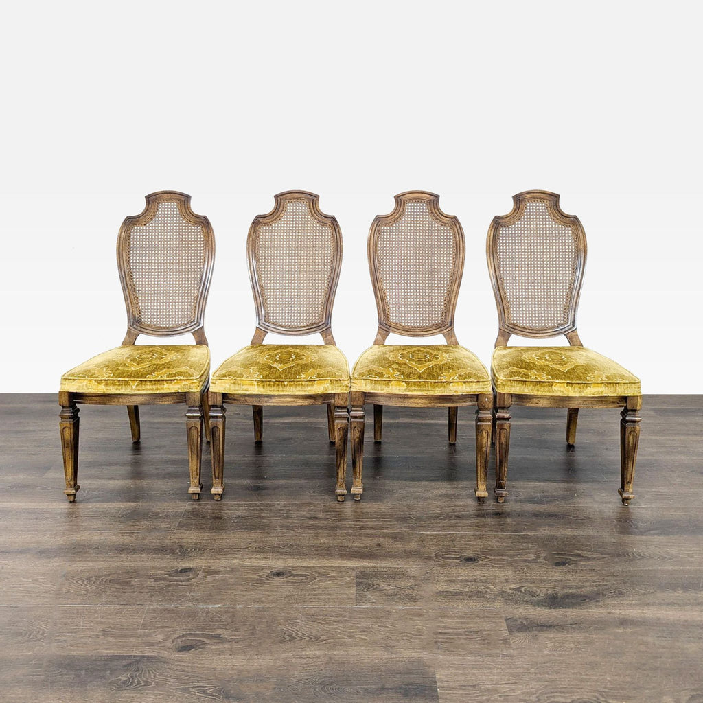 Set of four Century Furniture dining chairs with wooden frames, cane backs, and velvet upholstered seats.  