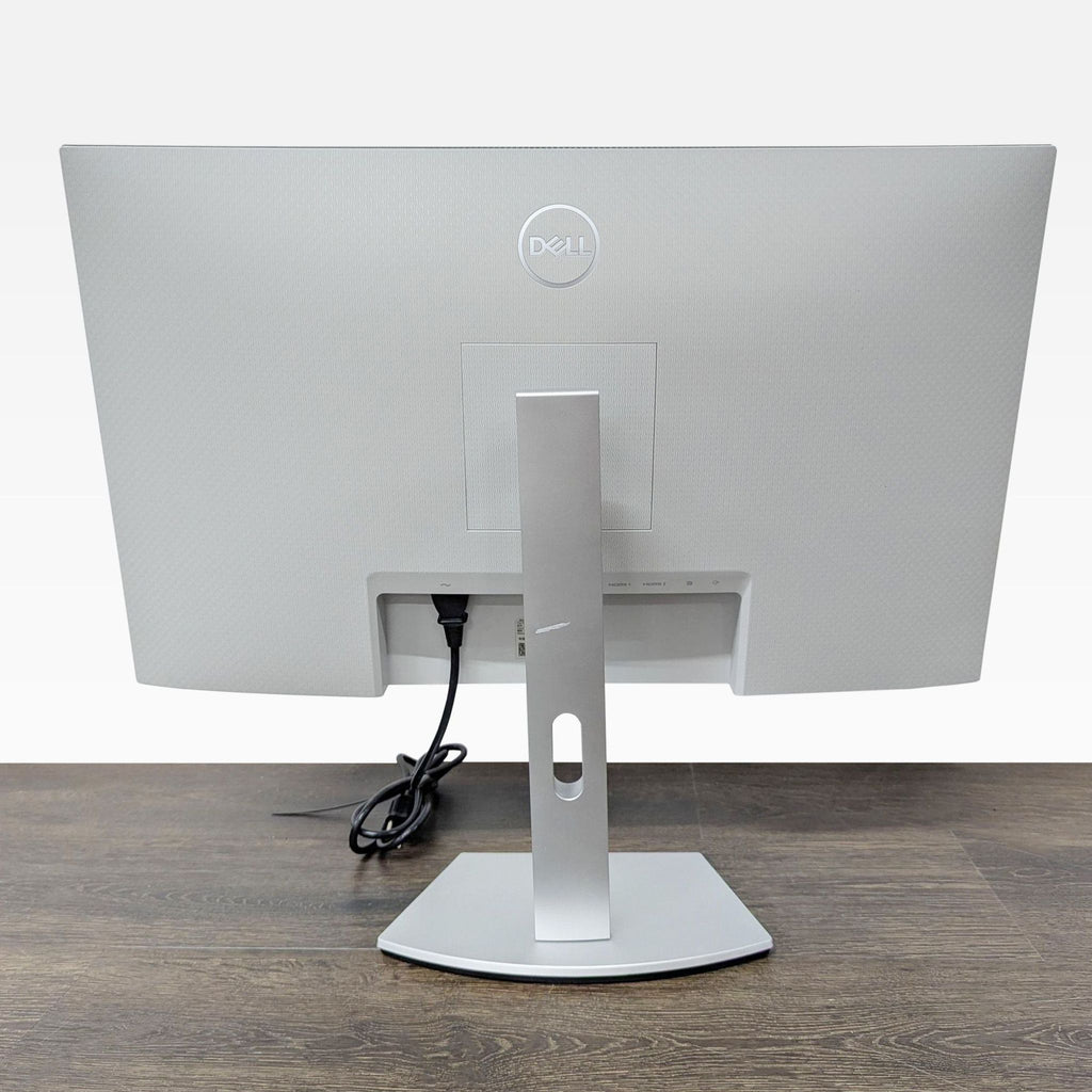 Side view of Dell 27" 4K monitor showing ports and VESA mount compatibility, suitable for offices or gamers.