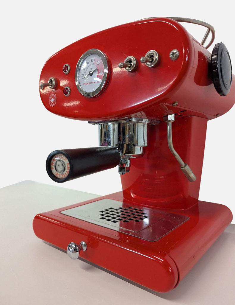 2. Coffee maker by Francis Francis, includes espresso machine and integrated milk frother, full set displayed.