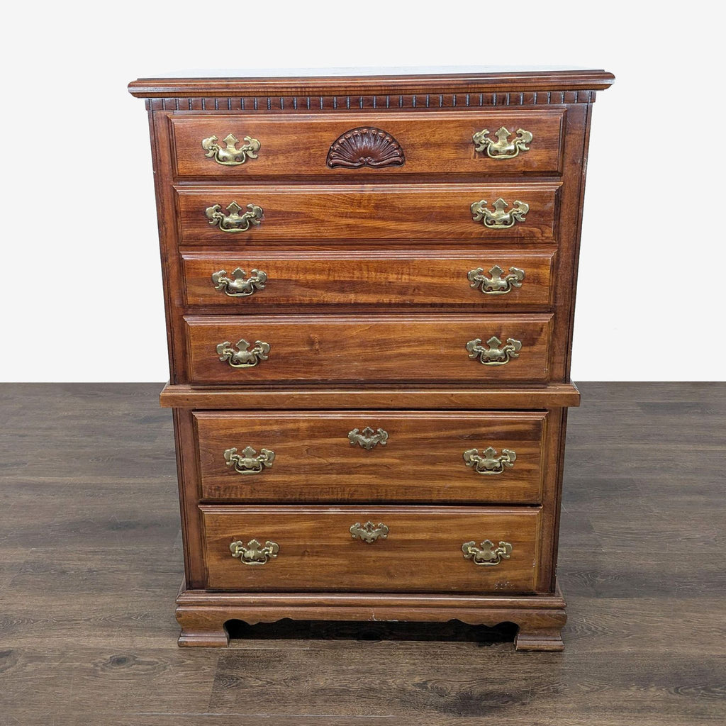 Classic Wooden Dresser with Brass Handles and Carved Details