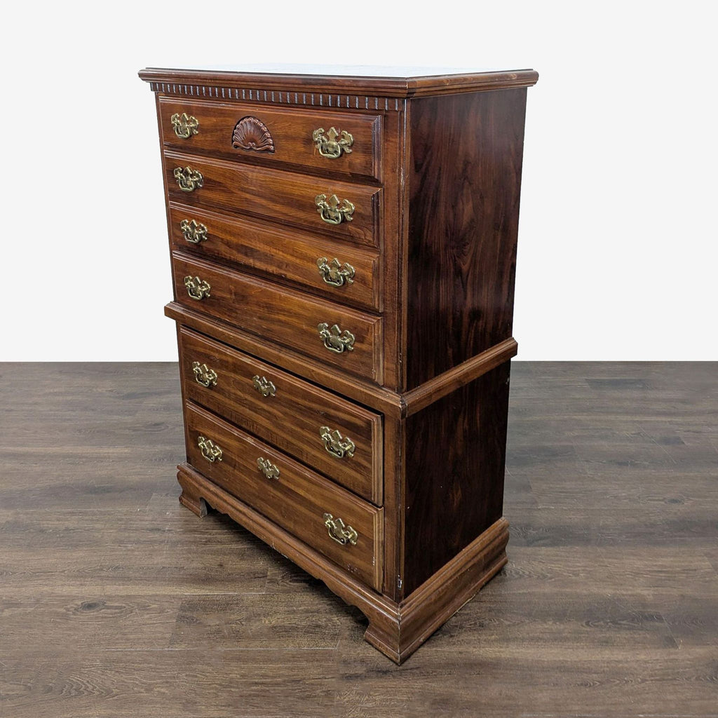 Classic Wooden Dresser with Brass Handles and Carved Details