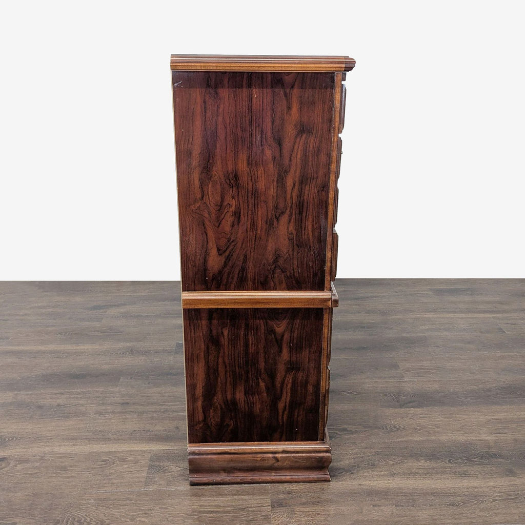 3. Side profile of an elegant brown dresser, highlighting sturdy wood grain and traditional carved accents.