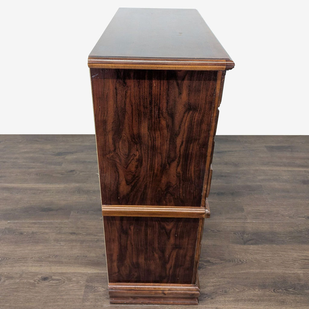 Classic Wooden Dresser with Brass Handles and Carved Details