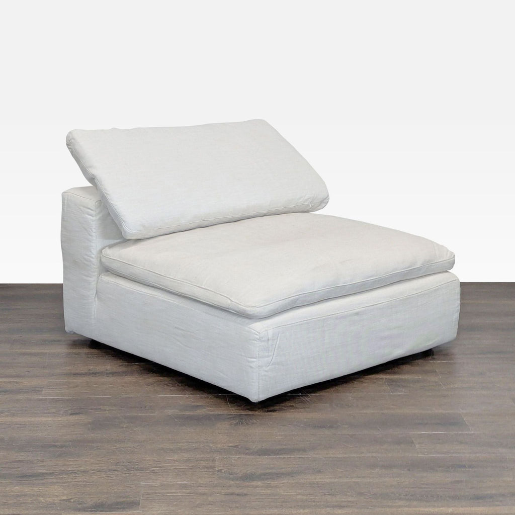 Light linen armless chair by Restoration Hardware, offering comfortable, stylish seating for any space.  