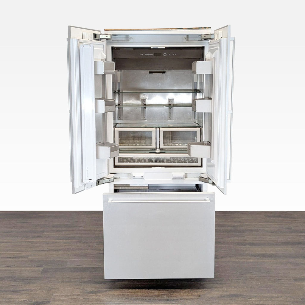 Spacious Gaggenau fridge featuring adjustable shelves, crisper drawers, and sleek stainless steel finish.