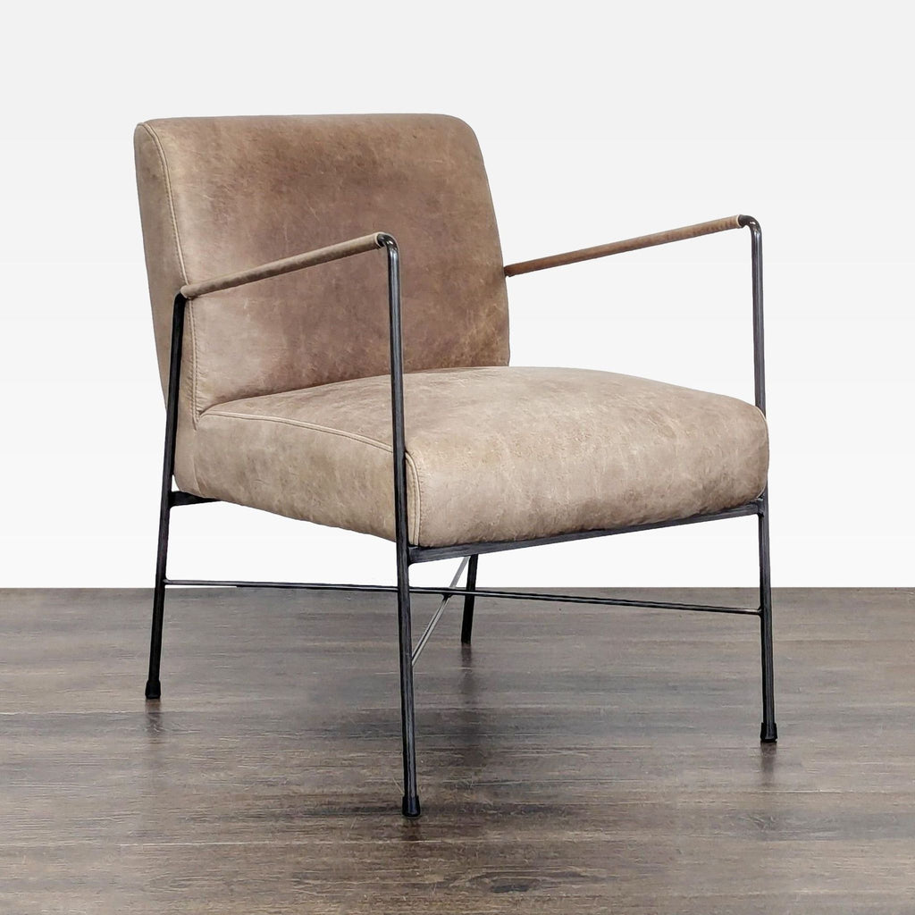 Modern lounge chair from Moe's Home Collection with soft brown cushions and sleek black metal base.