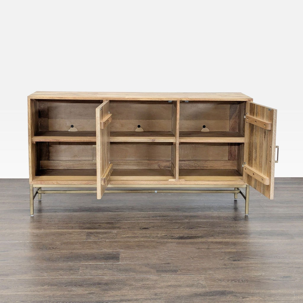 Joss and Main’s entertainment center featuring mango wood atop a sturdy metal frame.  
