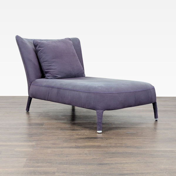 Maxalto Febo chaise lounge with curved back, tailored stitching, and sculptural upholstered frame, includes back cushion.  