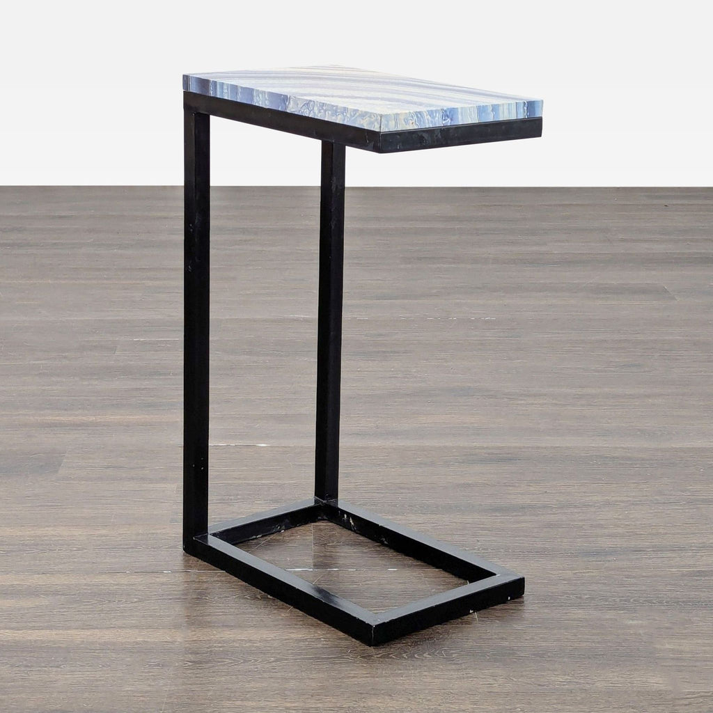 1. Modern side table with a blue agate-style rectangular top and slim black metal C-shaped frame.