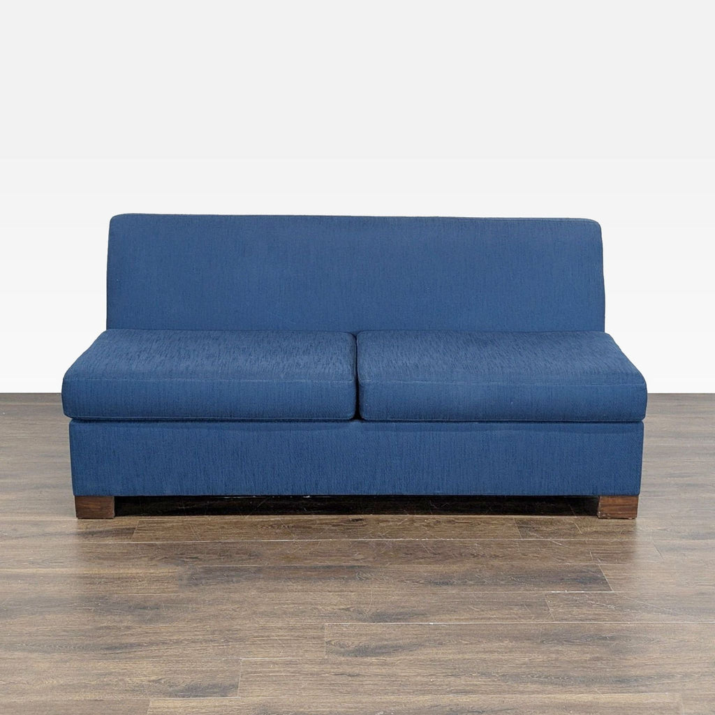 1. Blue Viesso sleeper sofa with modern design, perfect for small spaces or guest rooms, shown on wood floor.