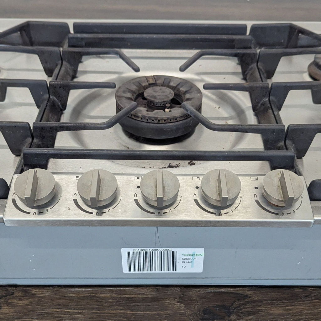 Gaggenau gas cooktop with easy controls, central high-power burner, and professional stainless steel finish.