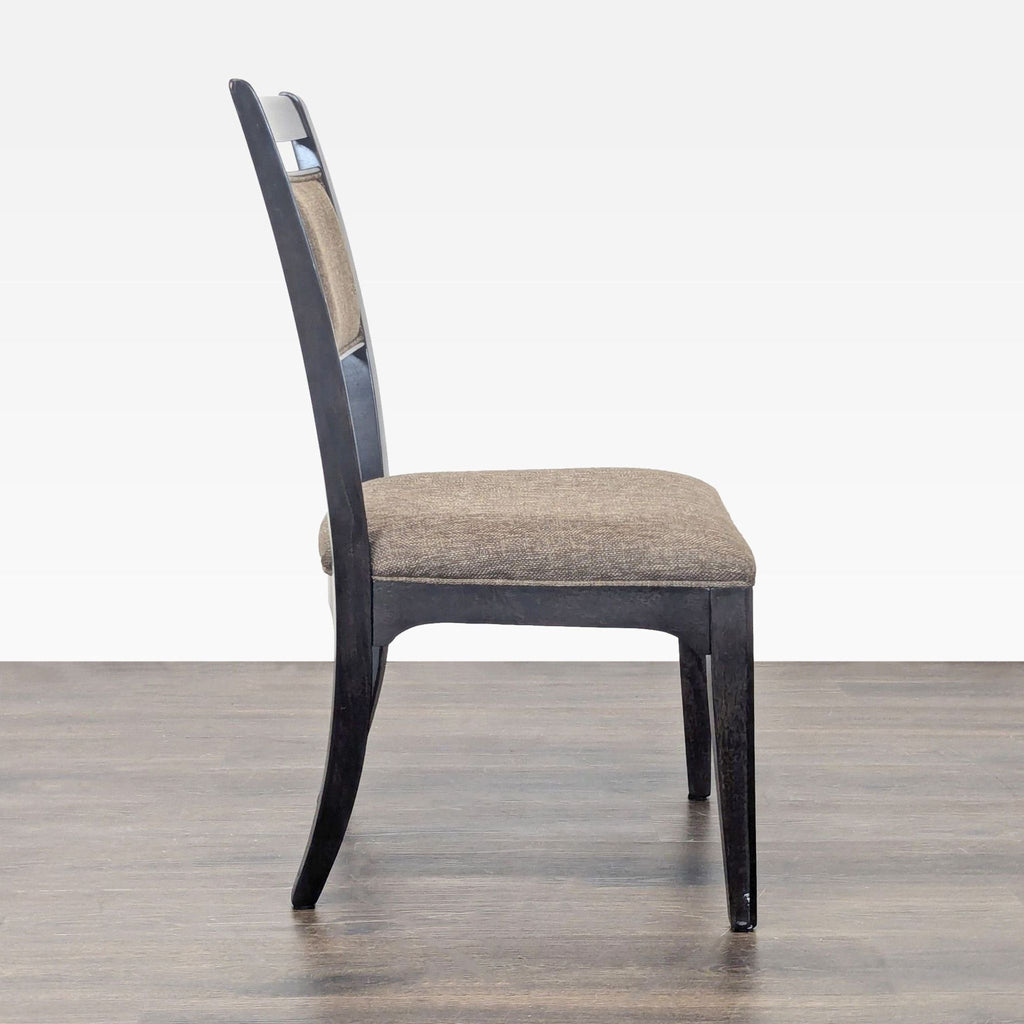 2. Contemporary Universal Furniture seat featuring a cushioned back and seat.  