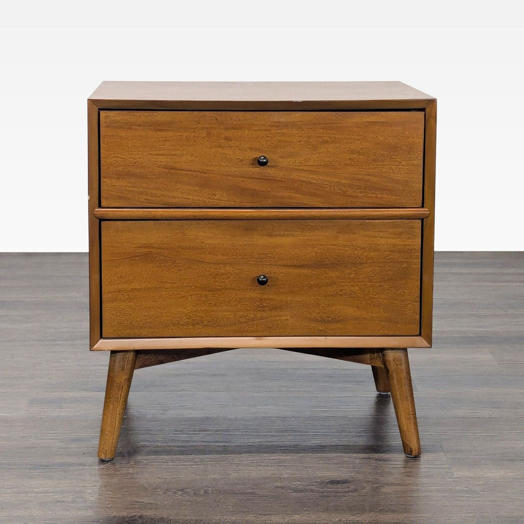 1. Najarian Furniture end table with two drawers, mid-century modern design, shown from the front on wood flooring.