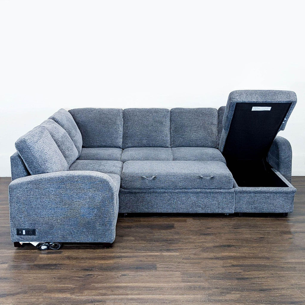 Spacious gray sectional sofa by Lifestyle Solutions, featuring hidden chaise storage and comfortable seating for families.