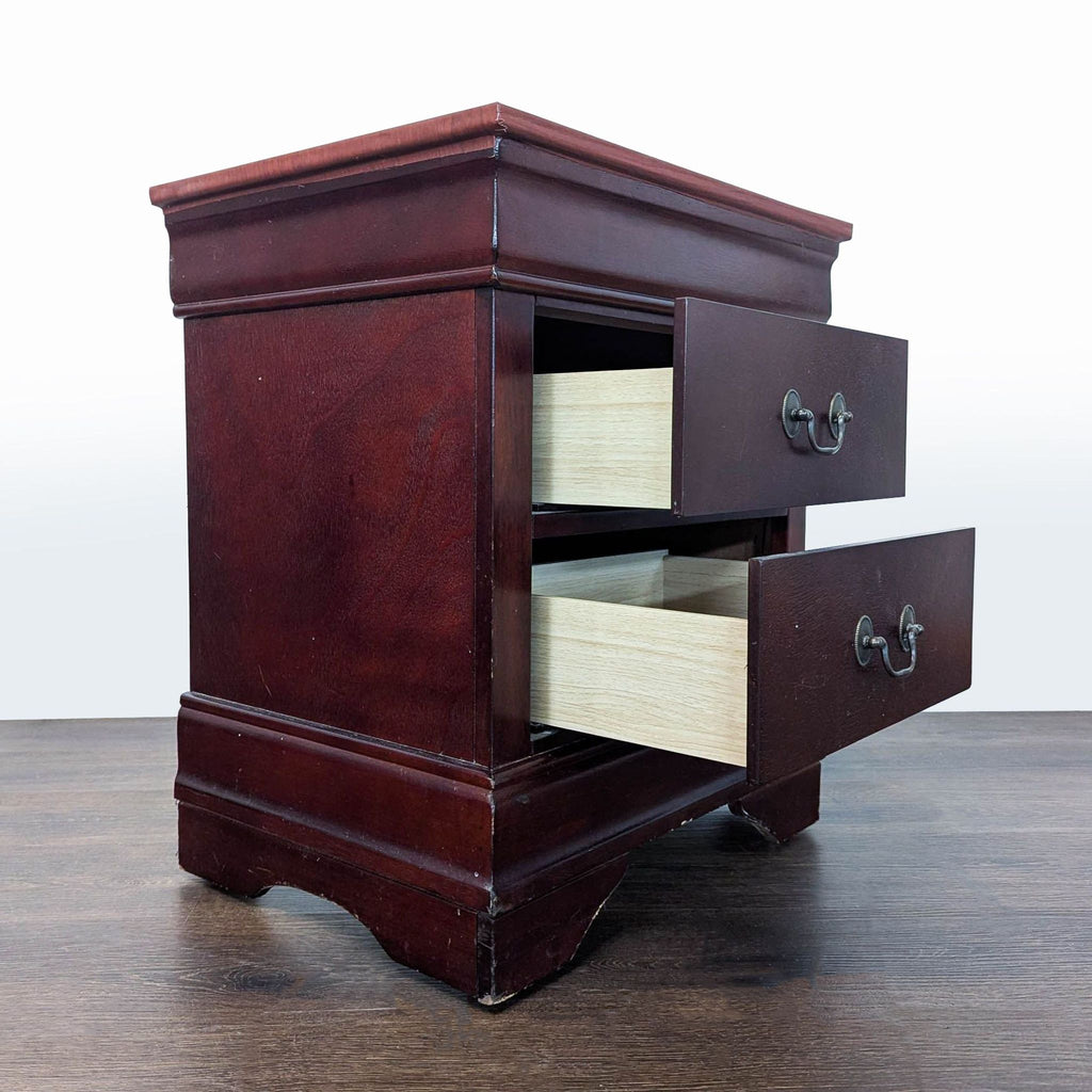 Set of two end tables featuring simple design, suitable as nightstands beside a bed.
