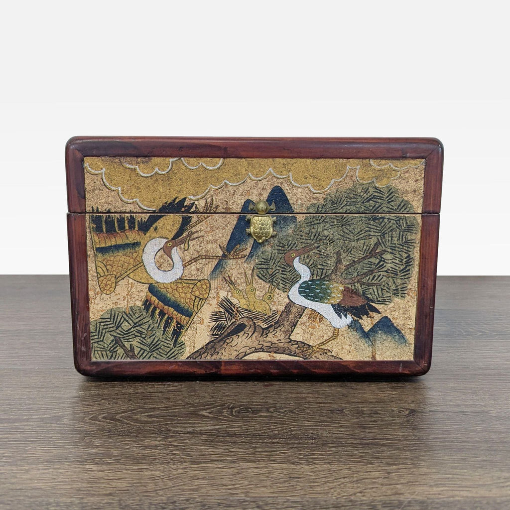 Decorated cork panels display cranes and a phoenix; the interior paper lining includes Chinese text and a lift-out tray.