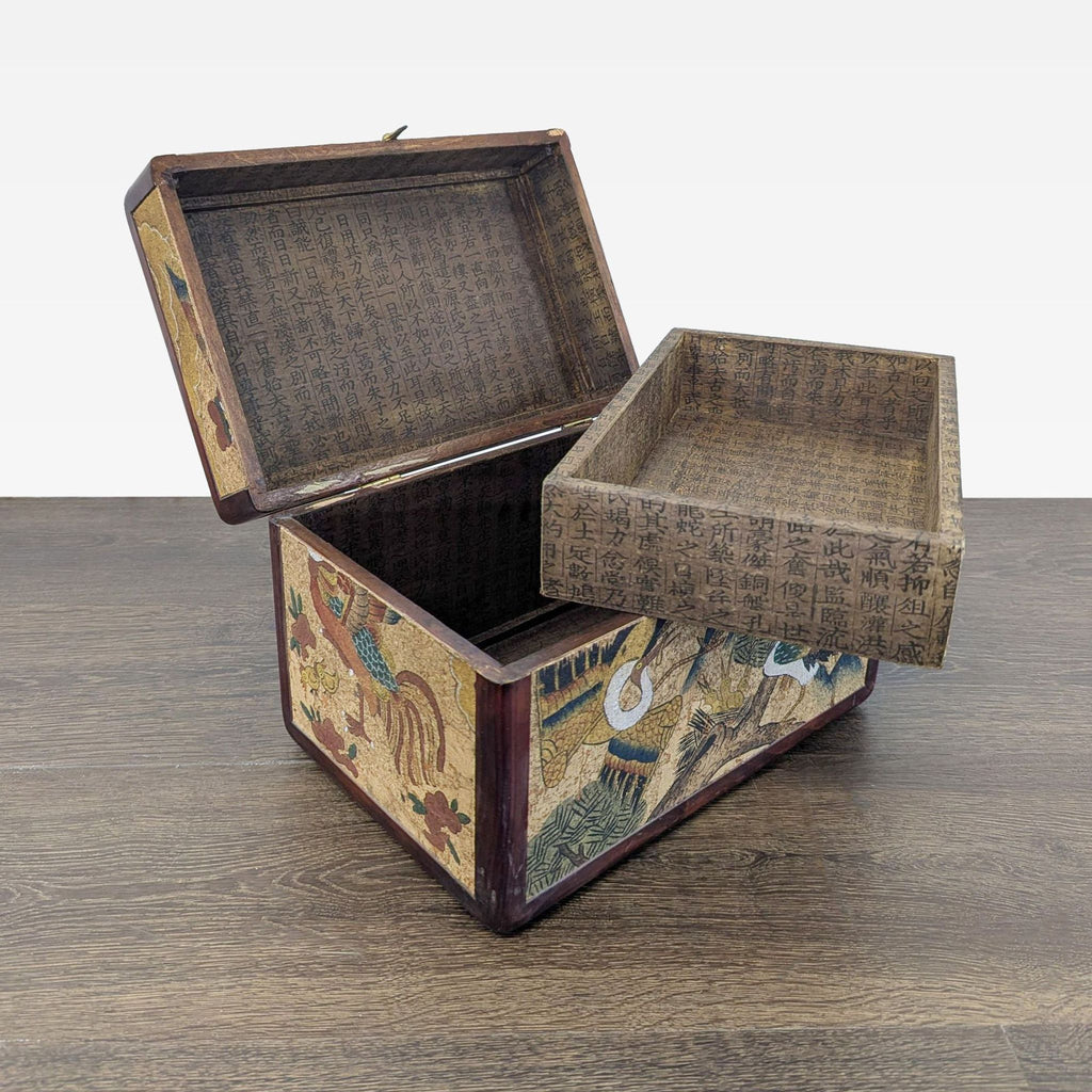 Box features hand-painted cranes and a phoenix over cork panels; inside is lined with Chinese script and has a tray.