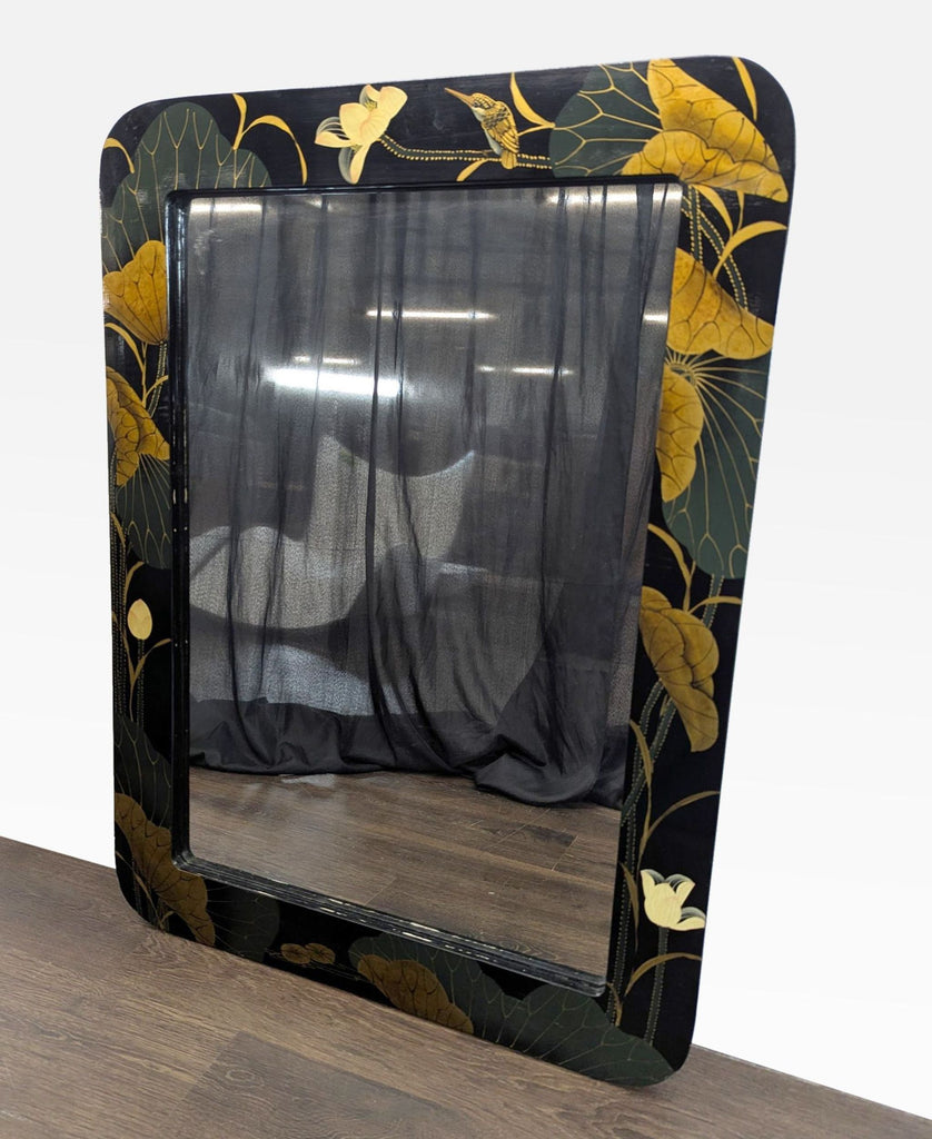 Modern mirror with abstract flower and bird patterns, emphasizing stylish decor.  