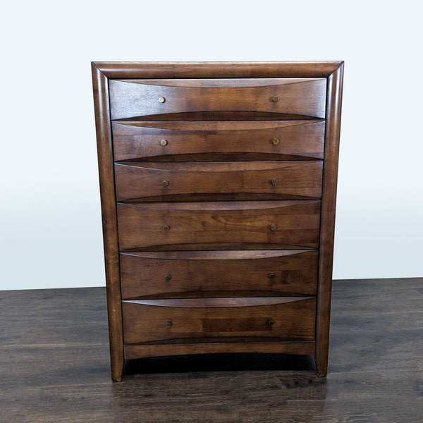Walnut finished Coaster dresser with six drawers and round pulls, offering modern style and spacious bedroom storage.  