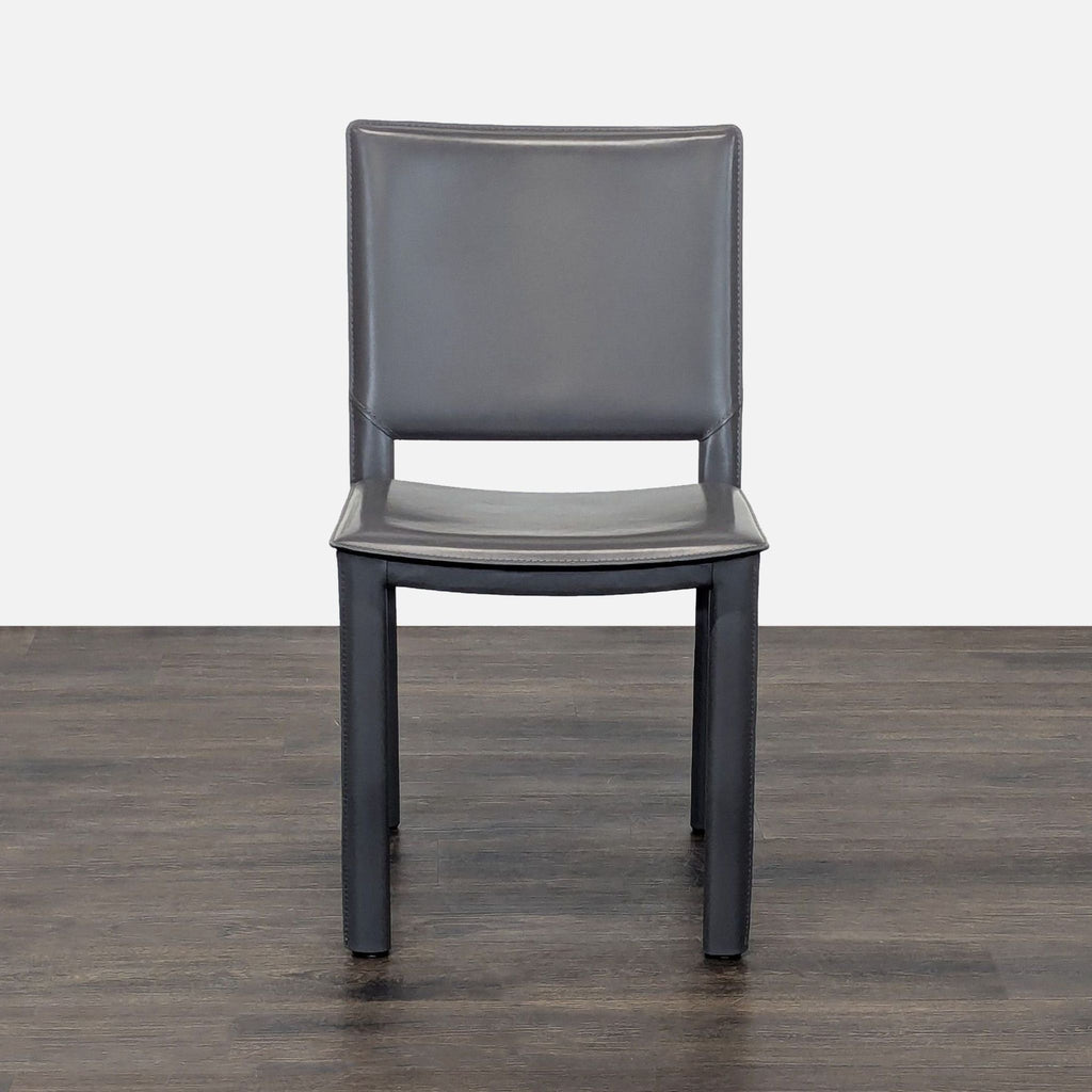 Madrid Chair by Room & Board, designed by Maria Yee, features steel frame wrapped in bonded leather.