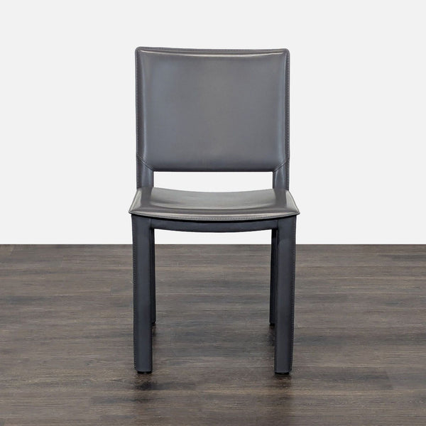 Madrid Chair by Room & Board, designed by Maria Yee, features steel frame wrapped in bonded leather.