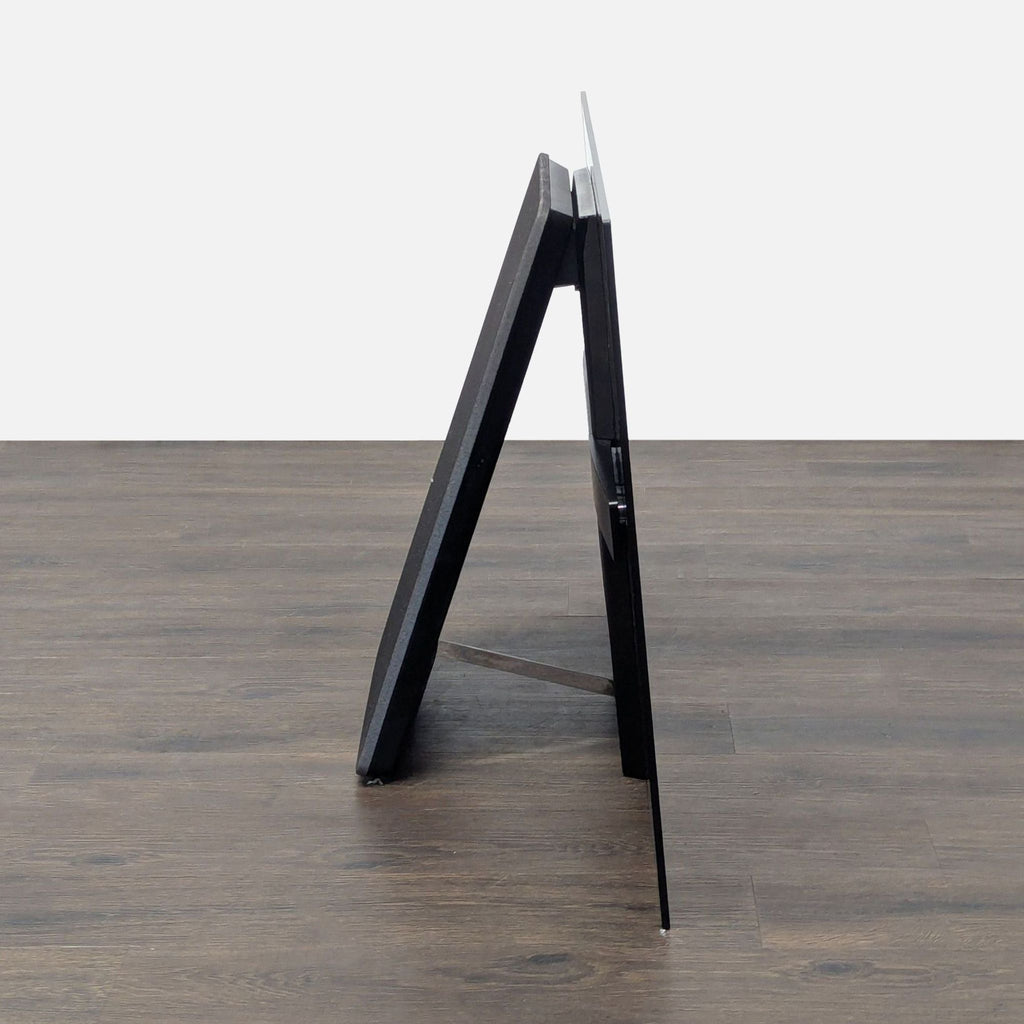 Sony brand 55-inch TV on a stand, featuring minimal bezels and ultra-high-definition picture quality for all media.