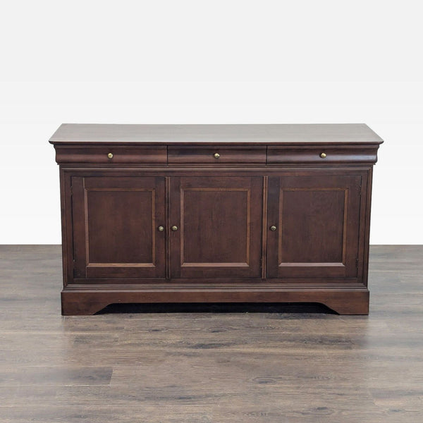 Elegant wooden sideboard with three drawers and three doors, each concealing a shelf, by HPL Division of Sherman Inc.