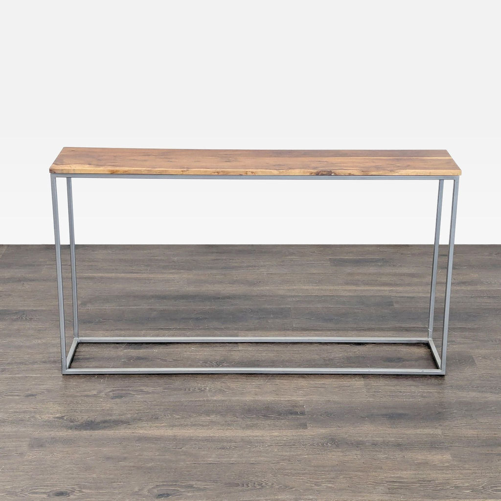 CB2 side table with a wood top and sleek metal frame.  