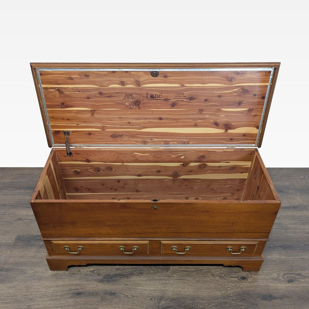 Open Lane cedar trunk with brass handles, displaying spacious interior and natural wood grain on lid and sides.  
