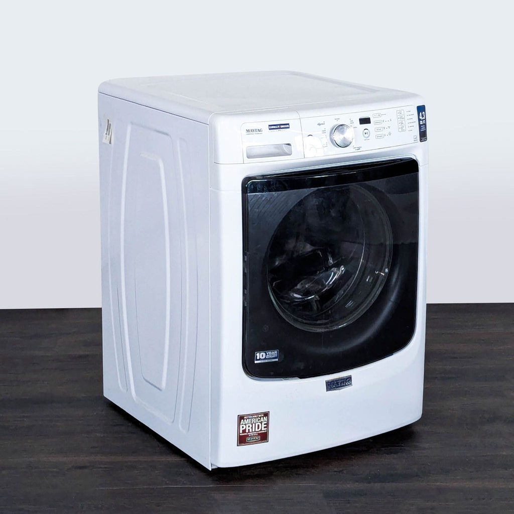 Maytag 4.3 cu. ft. front load washer/dryer combo, durable stainless steel drum, used but well maintained.